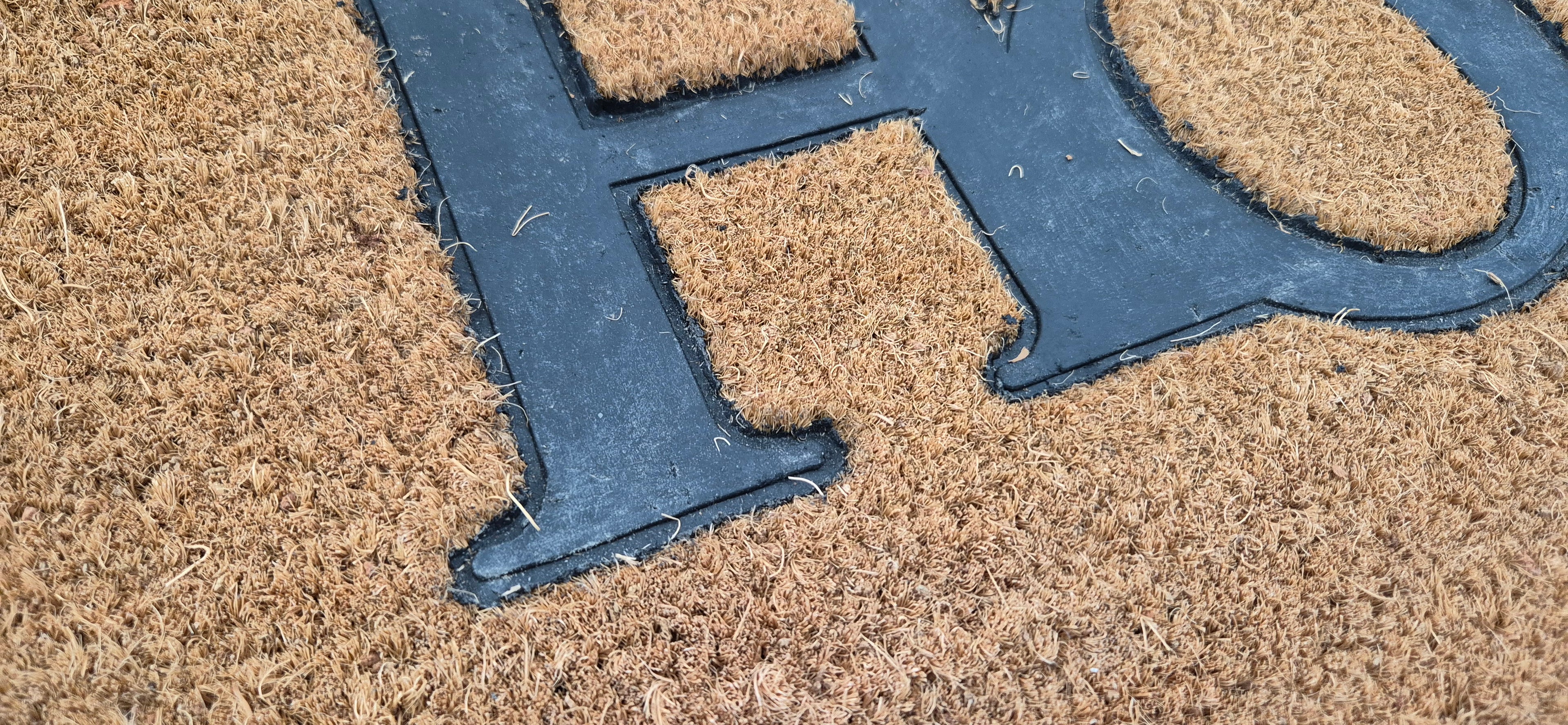 WELCOME CURSIVE- RUBBER EMBOSSED COIR VINYL-BACKED DOORMAT