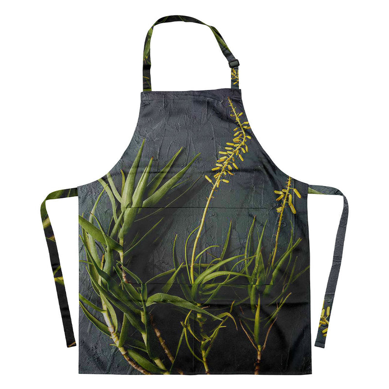 NATURAL YELLOW BLOSSOMS ALOE BUSH ON GREY APRON