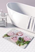 FLORAL PINK PROTEAS ON WHITE BATHMAT