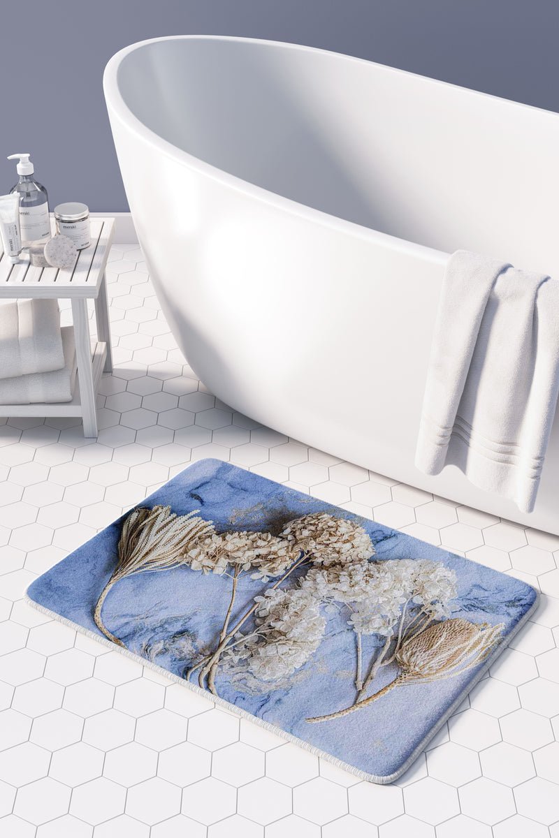 FLORAL CREAM BLEACHED HYDRANGEAS ON BLUE BATHMAT