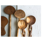 NATURAL BROWN WOODEN SPOONS ON GREY AND WHITE PLACEMAT