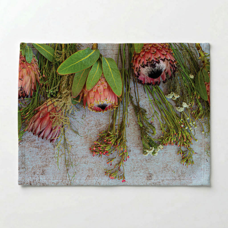 FLORAL PINK MIXED PROTEAS WITH GREEN FOLIAGE PLACEMAT
