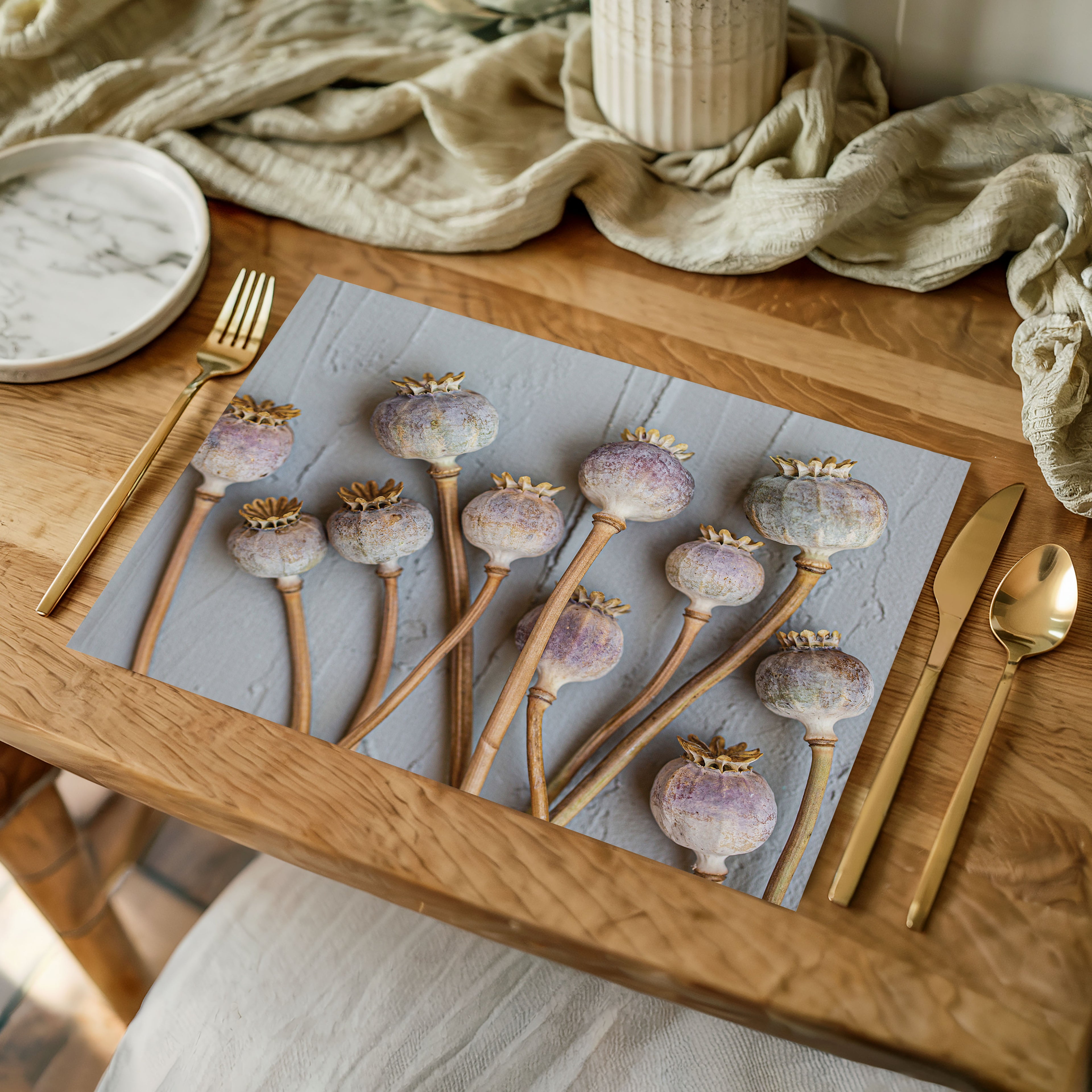 NATURAL PURPLE GIANT POPPY SEEDS ON GREY PLACEMAT