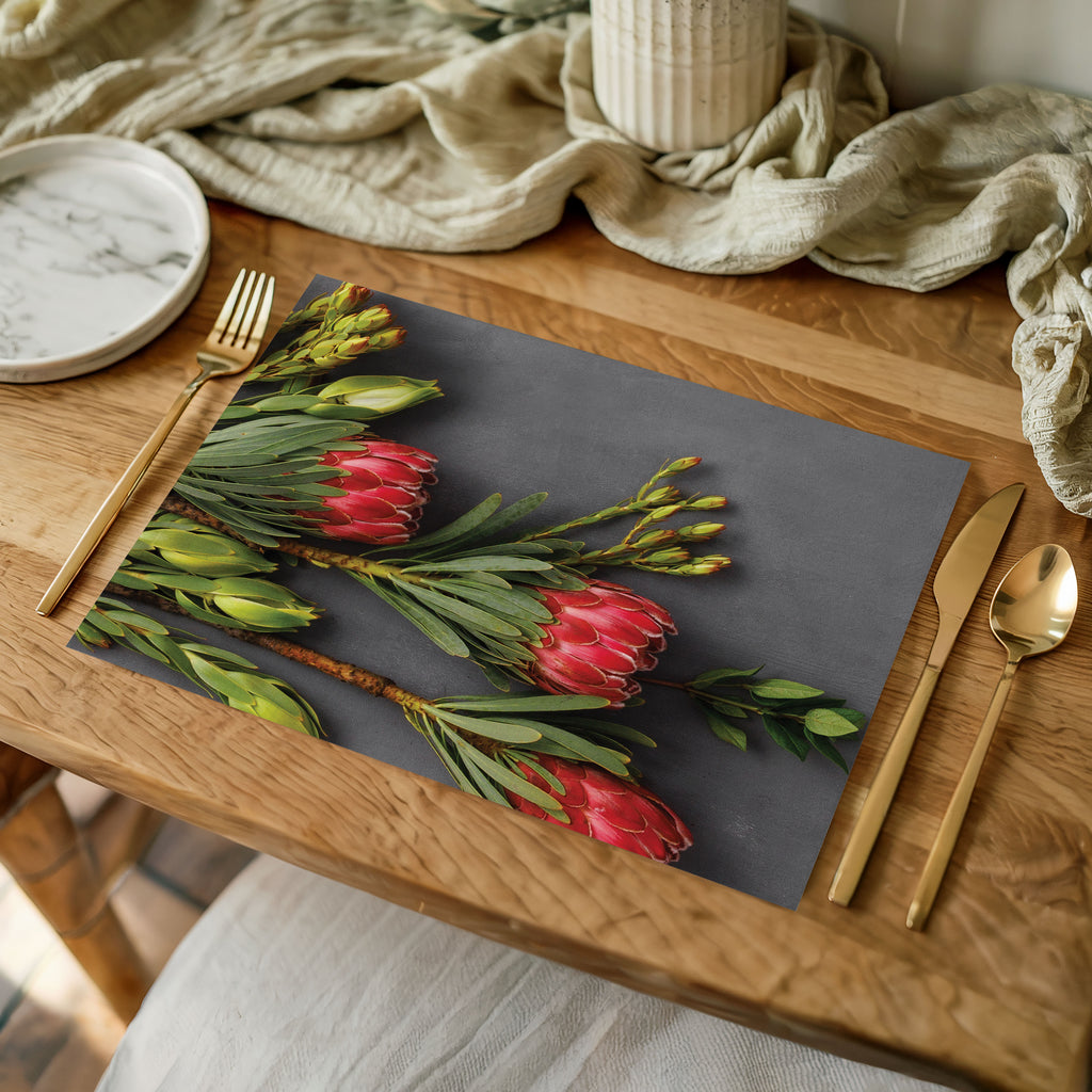 PINK PROTEAS ON GREY PLACEMAT