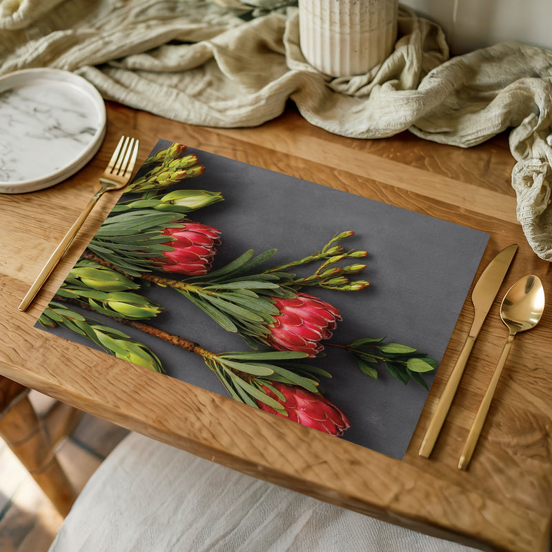 PINK PROTEAS ON GREY PLACEMAT