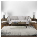 CONTEMPORARY BEIGE AND BLACK INK FRAME DISTRESSED RECTANGULAR RUG