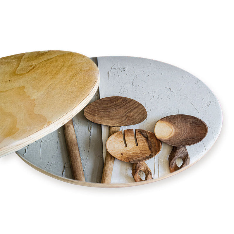 NATURAL BROWN WOODEN SPOONS ON GREY AND WHITE CHEESEBOARD