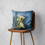 WHITE PROTEAS AND EUCALYPTUS ON BLUE SCATTER CUSHION
