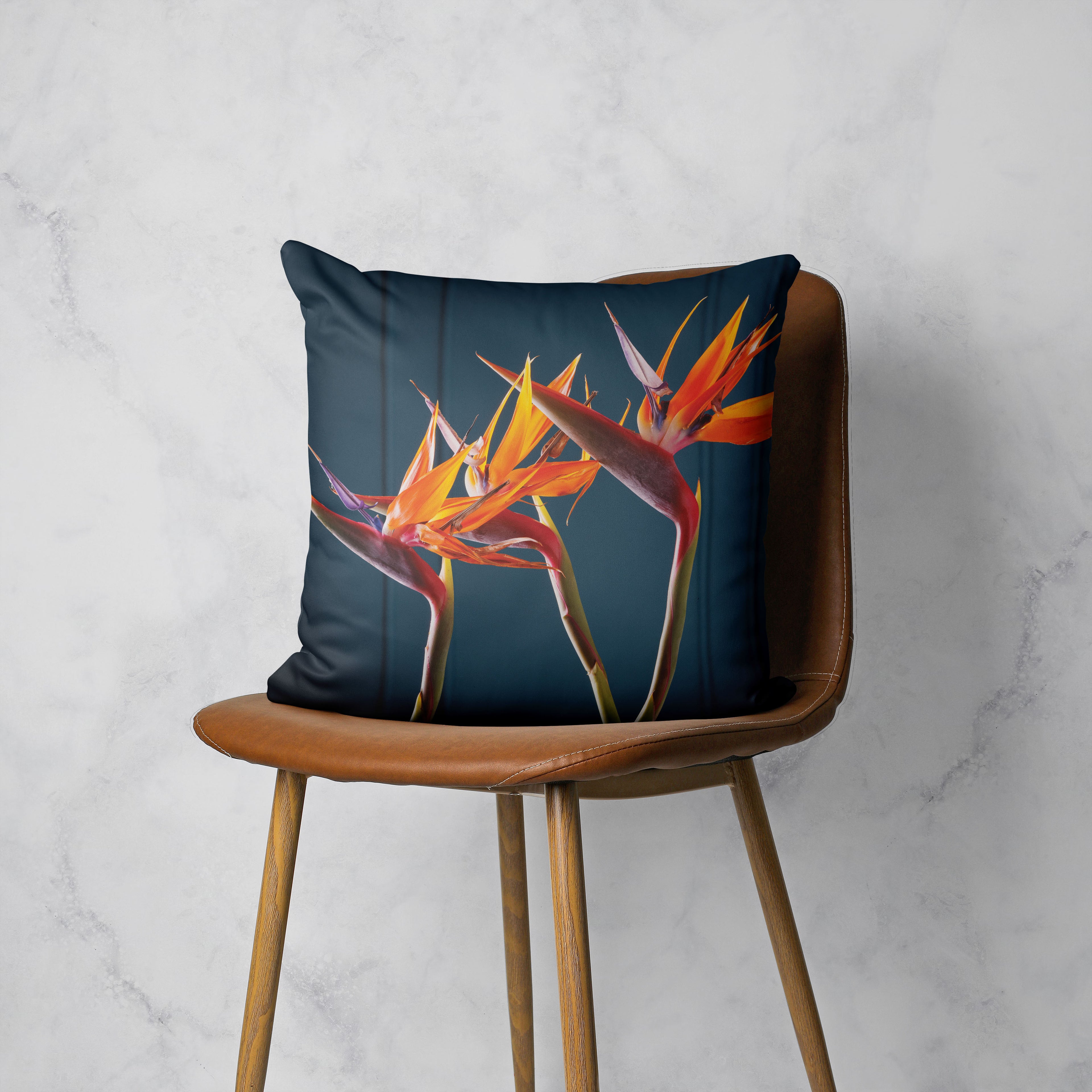 STRELITZIA ORANGE ON BLUE SCATTER CUSHION