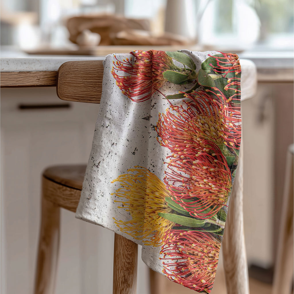 FLORAL ORANGE PIN CUSHIONS ON WHITE TEA TOWEL