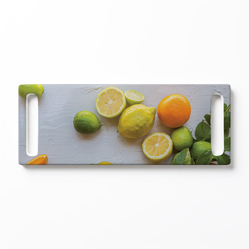 YELLOW AND ORANGE CITRUS ON WHITE DOUBLE HANDLE SERVING BOARD