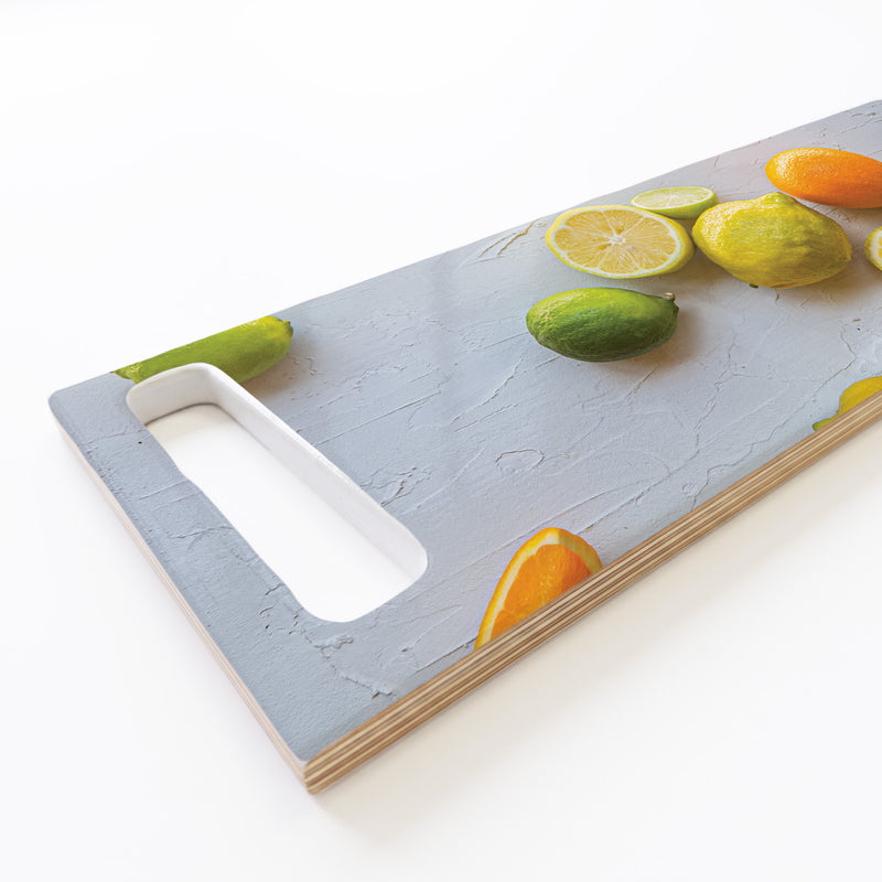 YELLOW AND ORANGE CITRUS ON WHITE DOUBLE HANDLE SERVING BOARD