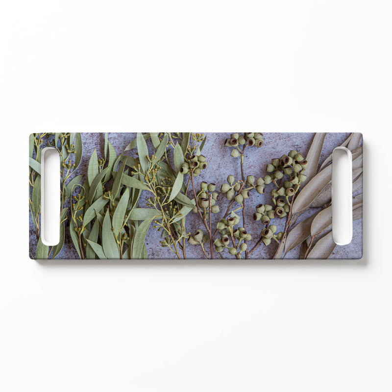 BROWN NATURAL AMBERNUTS WITH GREEN FOLIAGE DOUBLE HANDLE SERVING BOARD