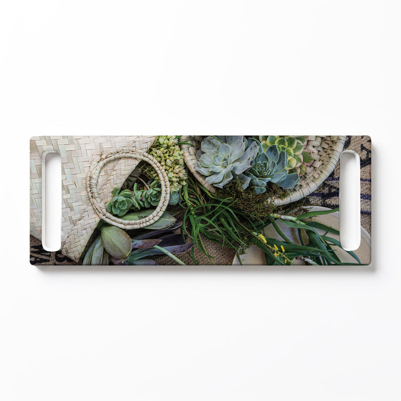 GREEN ALOE BOUQUET IN BASKET ON HESIAN DOUBLE HANDLE SERVING BOARD