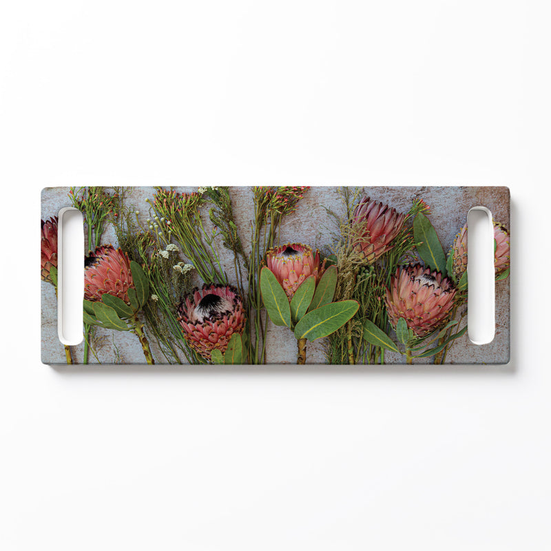 PINK MIXED PROTEAS WITH GREEN FOLIAGE DOUBLE HANDLE SERVING BOARD