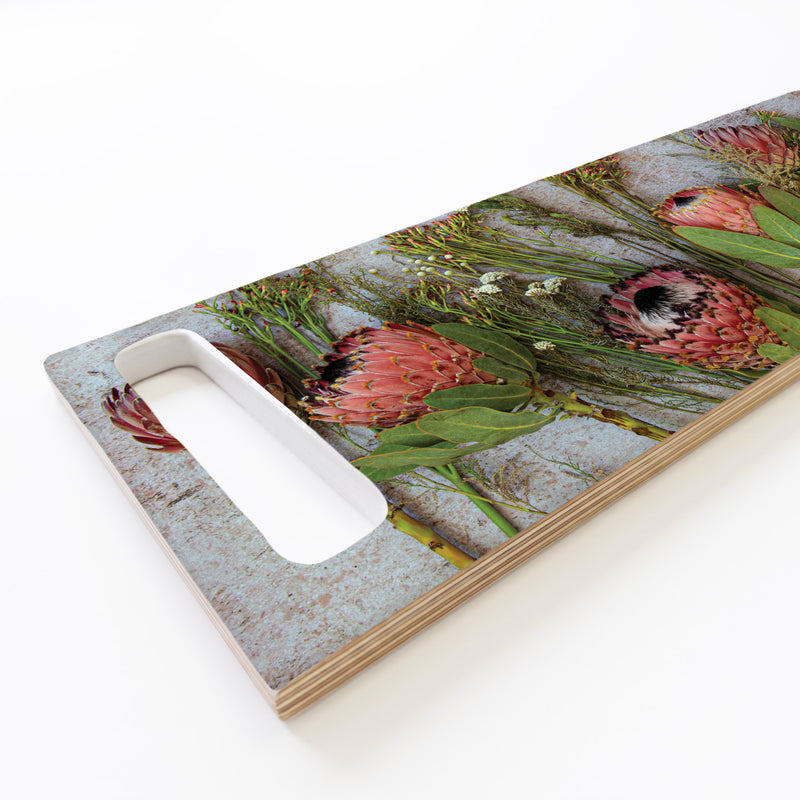 PINK MIXED PROTEAS WITH GREEN FOLIAGE DOUBLE HANDLE SERVING BOARD