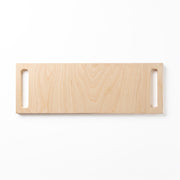 A rectangular light natural wood double-handle serving board, shown against a plain white background.