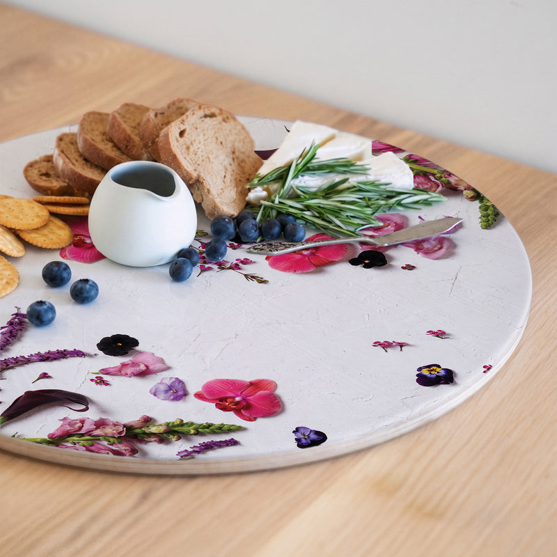 BLOSSOMS ON WHITE ROUND SERVING BOARD