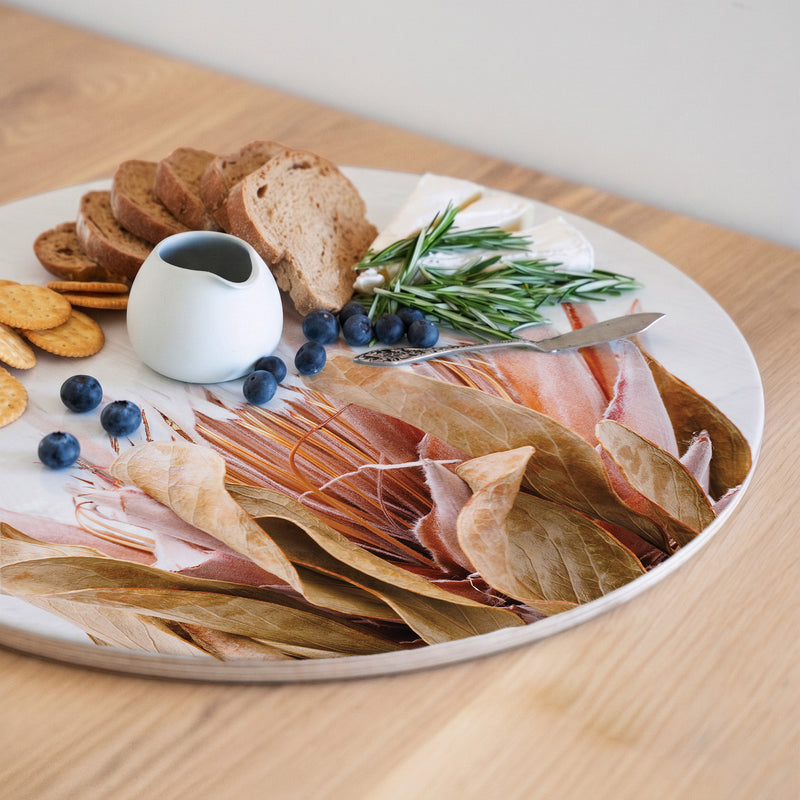 DRIED PINK KING PROTEA WITH LEAVES ROUND SERVING BOARD