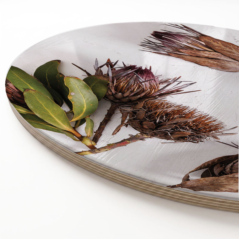 DRIED PROTEAS WITH GREEN LEAVES ROUND SERVING BOARD