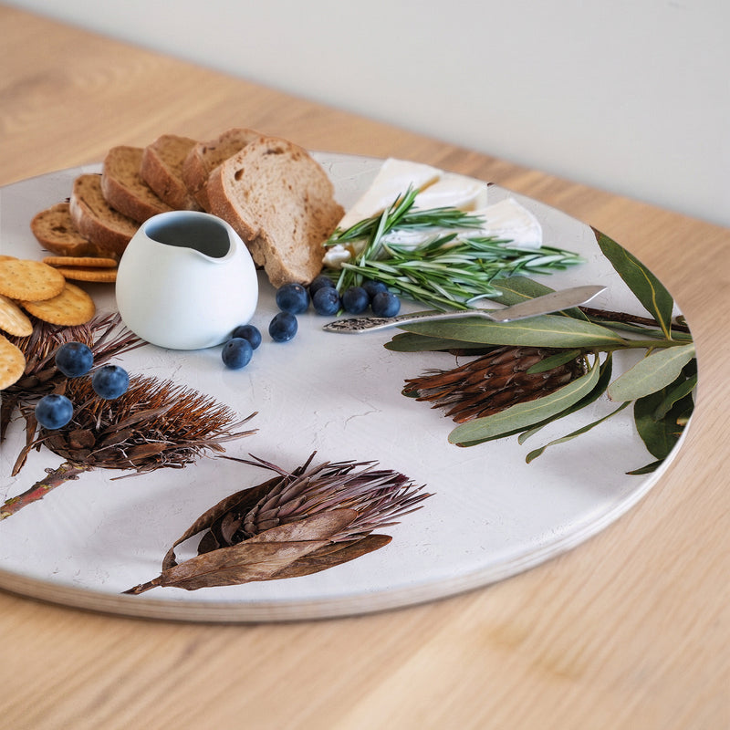 DRIED PROTEAS WITH GREEN LEAVES ROUND SERVING BOARD