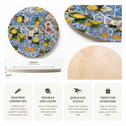 Round wooden serving platter with a colourful Lisbon tile pattern and citrus fruit print, shown alongside a plain light wood side view and feature callout icons on a white background.