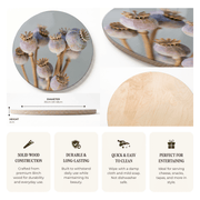 A set of round wooden serving platters featuring a printed poppy design, shown alongside a close-up of the natural wood grain and informational text highlighting its dimensions and features.