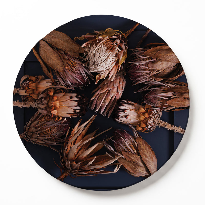 GOLDEN PROTEAS ON BLUE ROUND SERVING BOARD