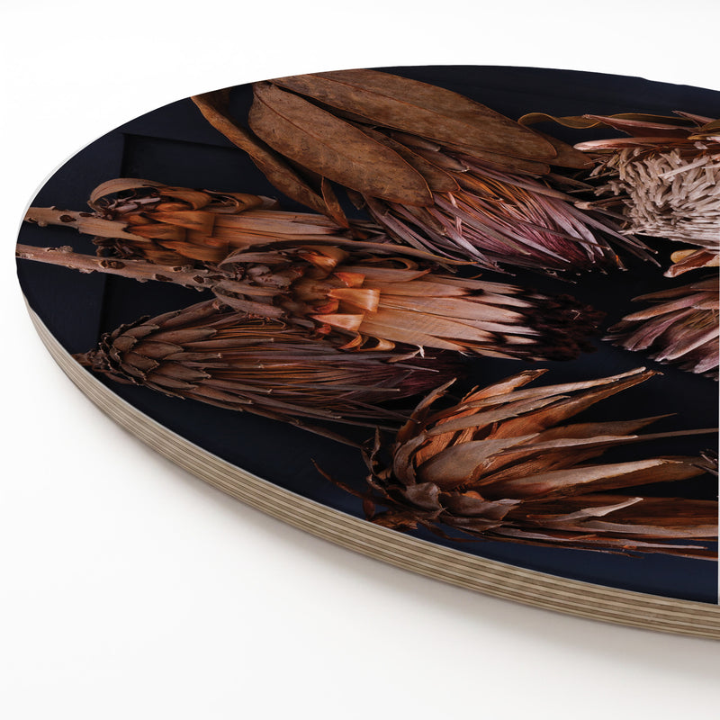 GOLDEN PROTEAS ON BLUE ROUND SERVING BOARD