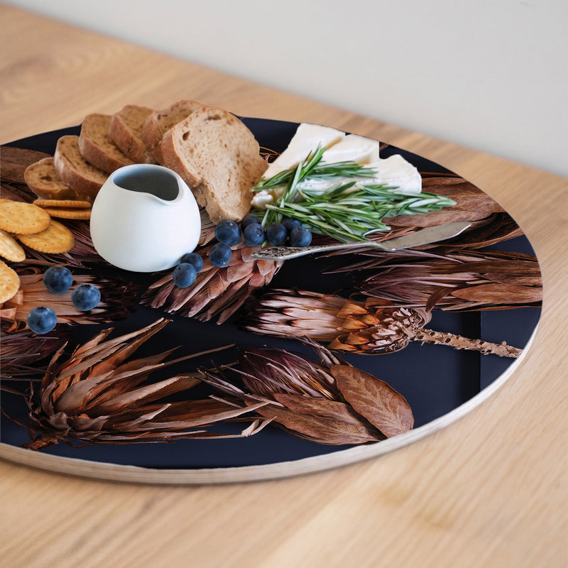 GOLDEN PROTEAS ON BLUE ROUND SERVING BOARD