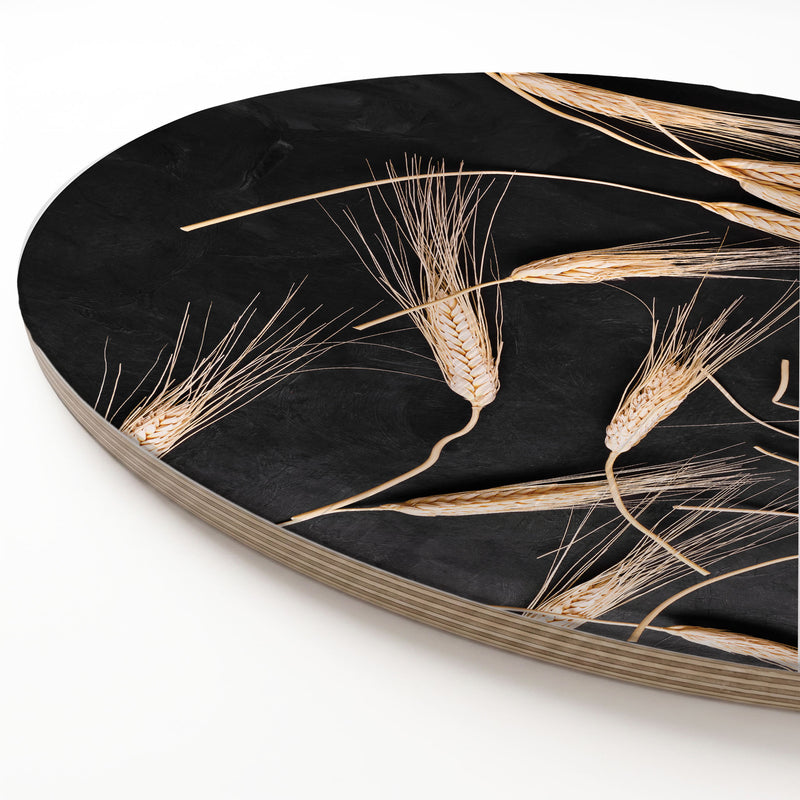 SCATTERED WHEAT ON BLACK ROUND SERVING BOARD