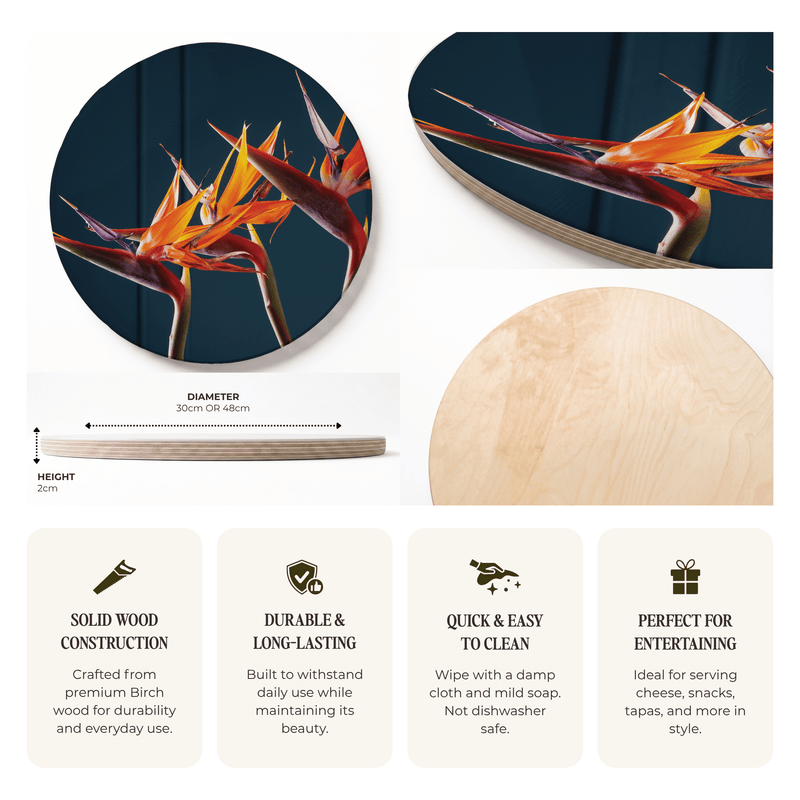 STRELITZIA TRIO ON RICH BLUE ROUND SERVING BOARD