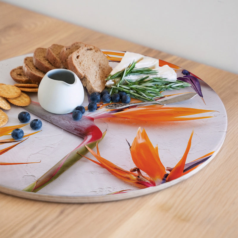 STRELITZIAS ON WHITE ROUND SERVING BOARD