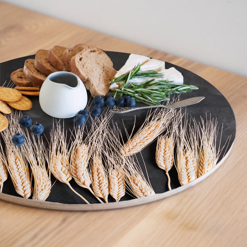 WHEAT ROW ON BLACK ROUND SERVING BOARD