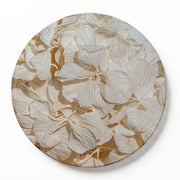 A round printed serving board featuring a close-up floral pattern of dried, bleached cream hydrangeas with beige and tan shadows, set against a clean white background.