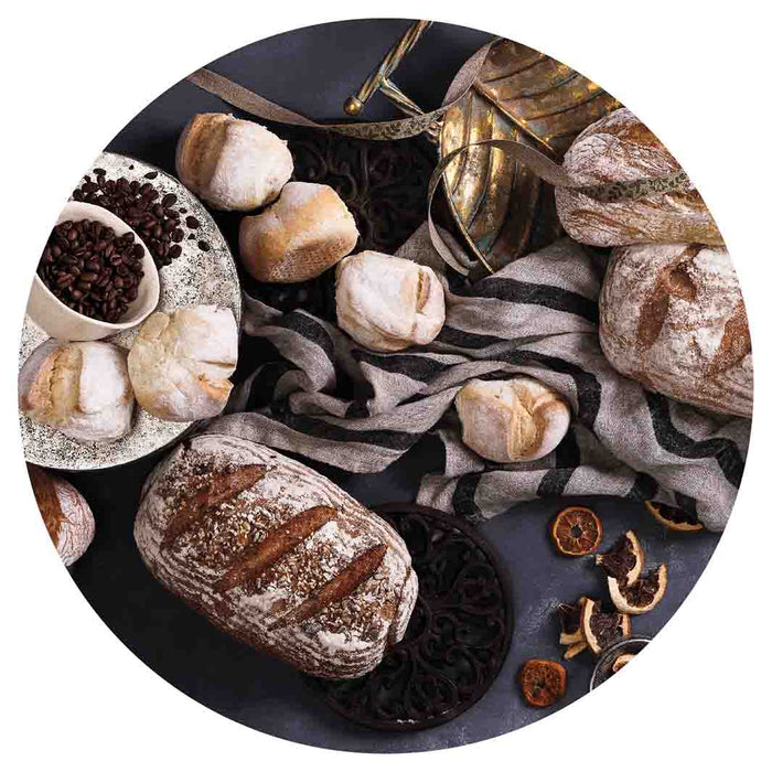 BREADS AND DRIED FRUIT ON BLACK ROUND COASTER